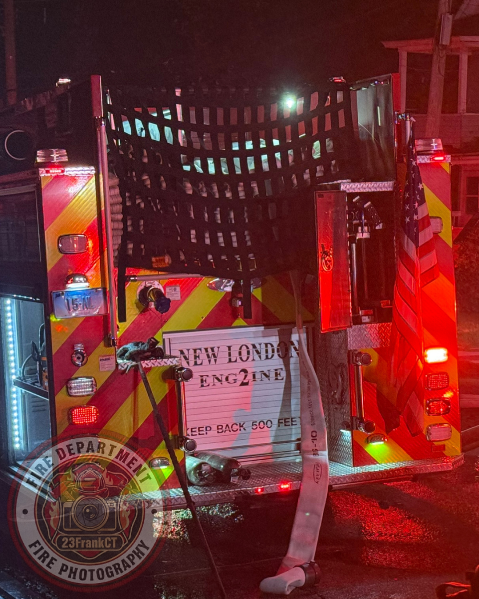 NEW LONDON, Conn. (July 15, 2026) — 23FrankCT was on scene as the New London Fire Department responded to a reported structure fire on Colman Street at approximately 10:27 p.m. Arriving crews encountered heavy fire conditions and quickly initiated an aggressive fire attack.
Due to the volume of fire, a second alarm was transmitted, bringing additional personnel to the scene, including off-duty New London firefighters and several mutual aid departments.
Firefighters successfully contained the fire to the primary structure, preventing the flames from extending to neighboring buildings despite significant damage to the home.
Two occupants were transported to a local hospital with minor injuries. Four residents were displaced as a result of the fire.
No firefighters were injured during suppression operations.
The cause of the fire remains under investigation by the New London Fire Investigation Team. NEW LONDON, Conn. (July 15, 2026) — 23FrankCT was on scene as the New London Fire Department responded to a reported structure fire on Colman Street at approximately 10:27 p.m. Arriving crews encountered heavy fire conditions and quickly initiated an aggressive fire attack.
Due to the volume of fire, a second alarm was transmitted, bringing additional personnel to the scene, including off-duty New London firefighters and several mutual aid departments.
Firefighters successfully contained the fire to the primary structure, preventing the flames from extending to neighboring buildings despite significant damage to the home.
Two occupants were transported to a local hospital with minor injuries. Four residents were displaced as a result of the fire.
No firefighters were injured during suppression operations.
The cause of the fire remains under investigation by the New London Fire Investigation Team.